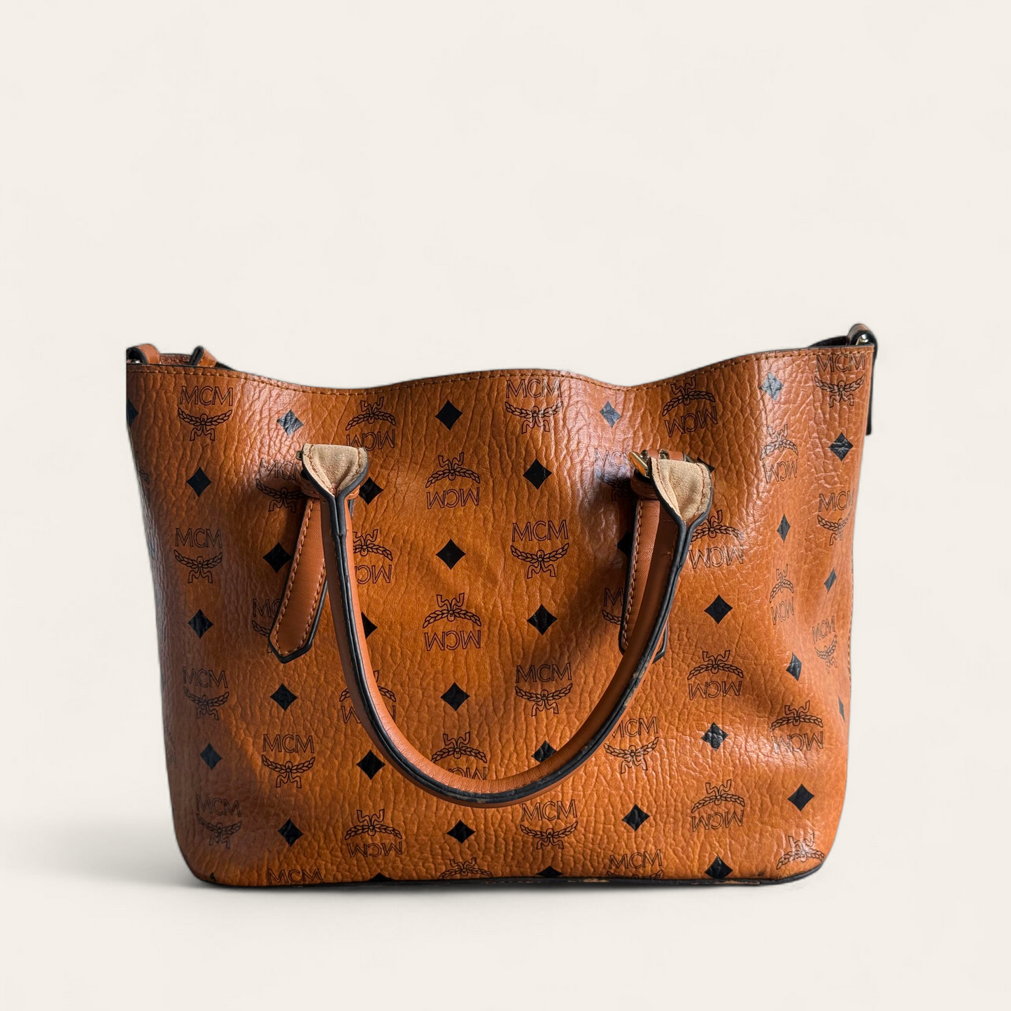 “Preloved brown tote bag, stylish & spacious.”