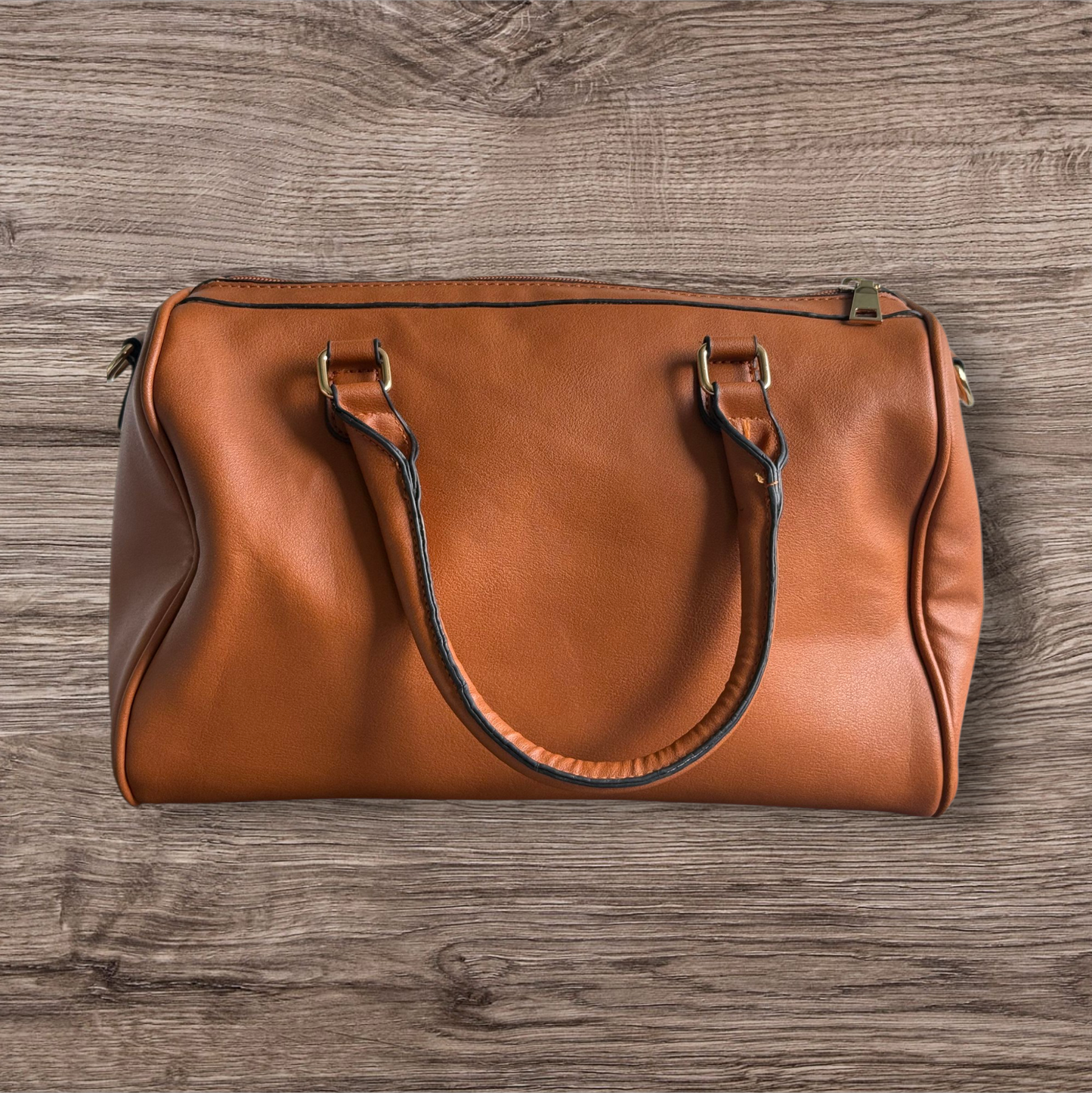 Preloved Brown Cut-Out Handbag – Elegant & Unique